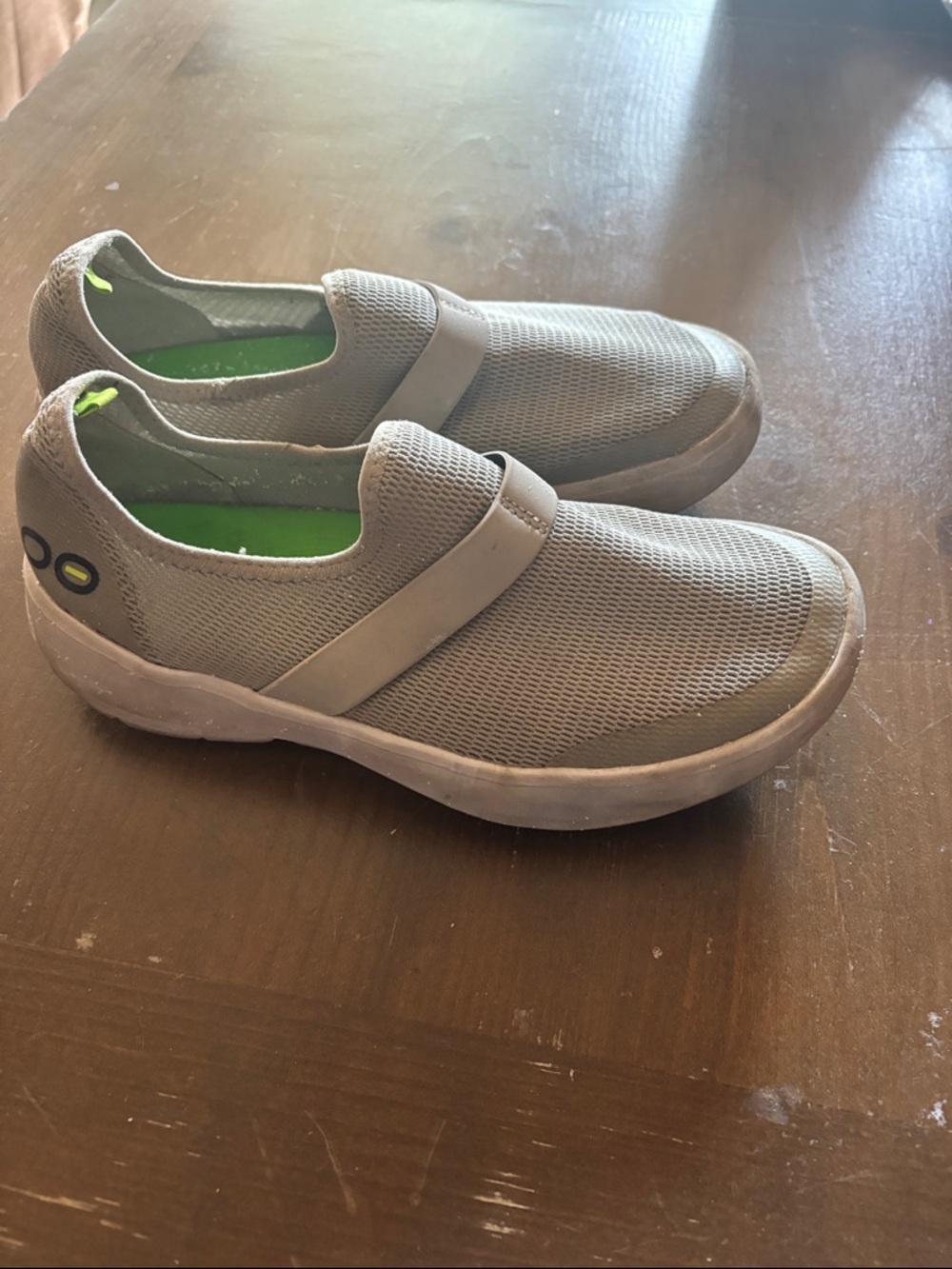 OOFOS Women's oomg eezz  recovery slide ons in Gray with Lime Accents